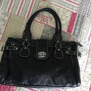 Red by marc ecko black bag. Perfect condition!